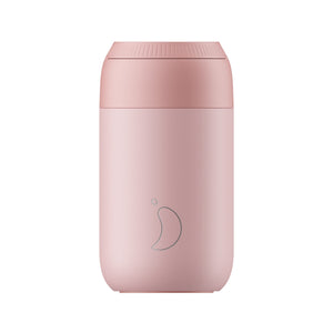 Image of the Chilly's Series 2 Coffee Cup in Blush Pink. This all pink design has a twisting lid and the chilly's logo is etched onto the cup body.
