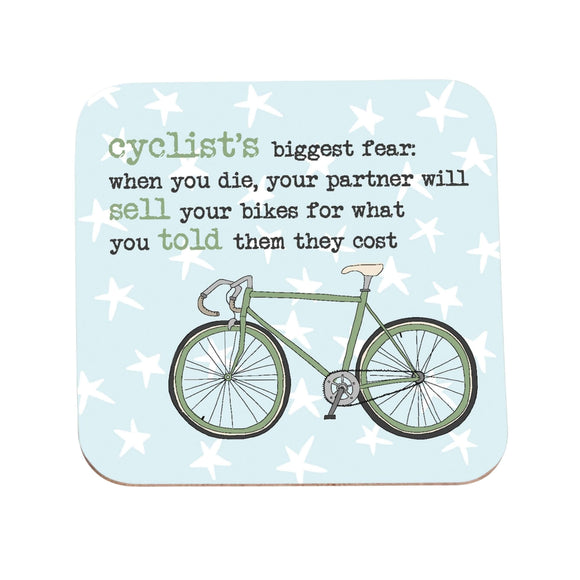Image of a coaster by Dandelion Stationery. The coasters background is pale blue with white stars. On the bottom half of the coaster is a bike illustration, on the top half are the words 'cyclist's biggest fear: when you die, your partner will sell your bikes for what you told them they cost.'