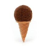 Photo of the Jellycat Irresistible Ice Cream Chocolate cuddly toy. The ice cream top is a fluffy dark brown fabric. Embroidered black eyes and smile can just be seen on one side. The cone is beige with stitching making it look more like a waffle cone.