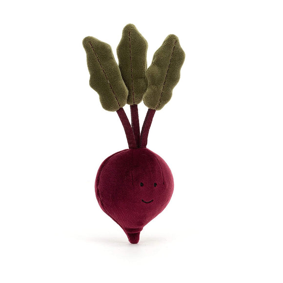 Photo of the Jellycat Vivacious Vegetable Beetroot. This cuddly toy has a beetroot red body with simple smiley face. Three stalks out of the top have three moss green leaves.