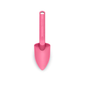 Photo of the Scrunch plastic spade in flamingo pink. This spade is simple in design with a chunky handle to make it easy for children to hold.